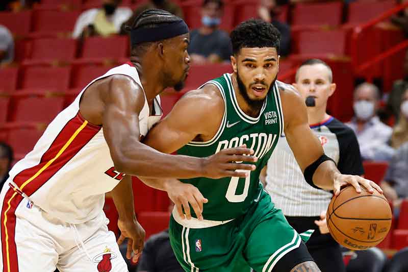 Celtics and Heat battle fiercely for promotion.